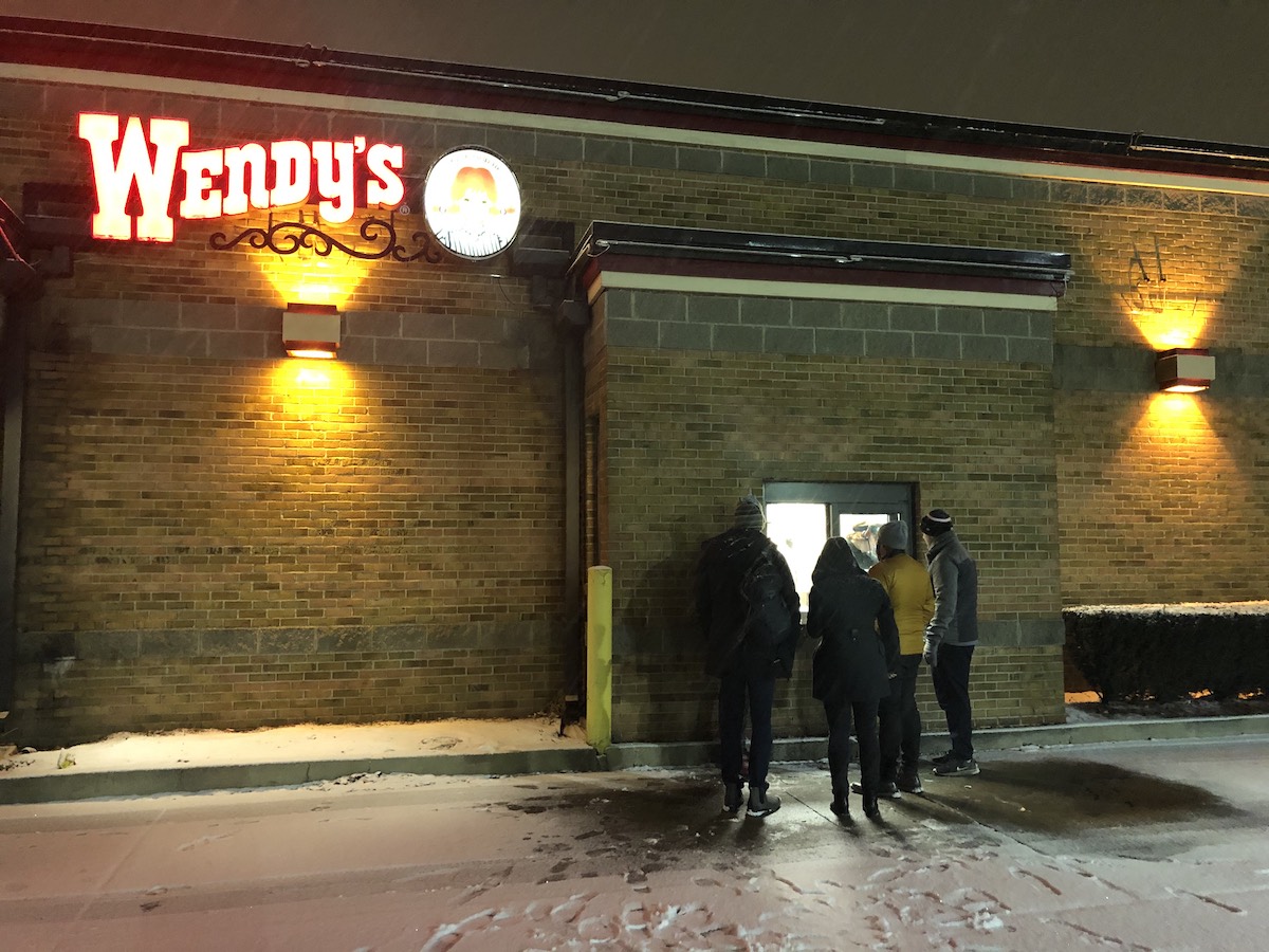 Picture of us huddled outside Wendy's trying to get food the night before our meeting